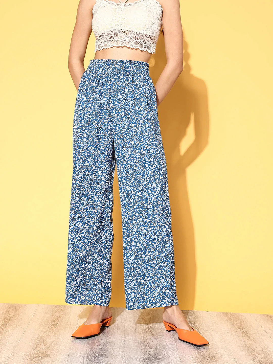 Berrylush Women Blue & White Floral Printed Loose Fit High-Rise Elastic Waist Pleated Trousers