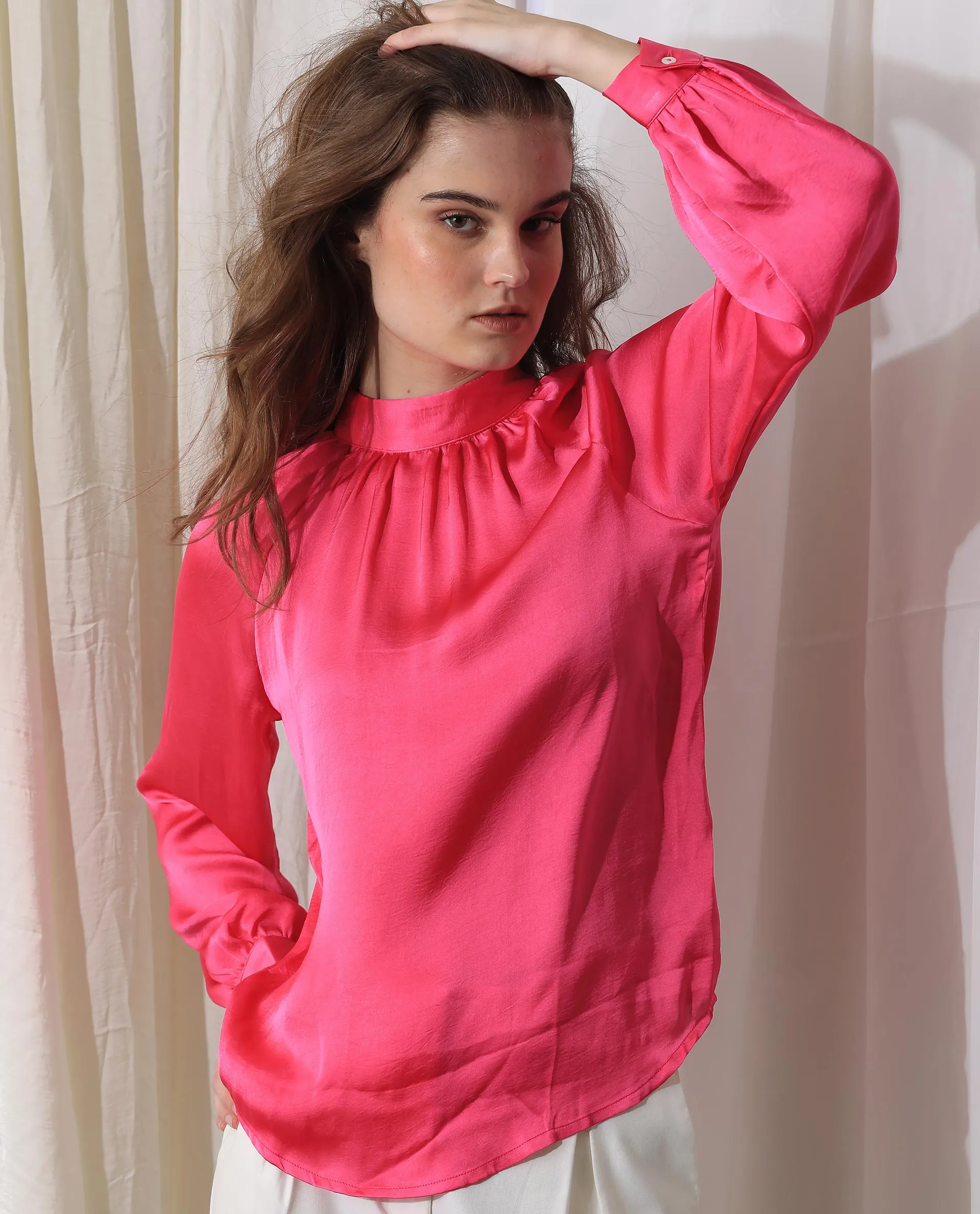 Rareism Women Kaylinn Fluorescent Pink Polyester Fabric Full Sleeves Button Closure High Neck Volume Sleeve Relaxed Fit Plain Top